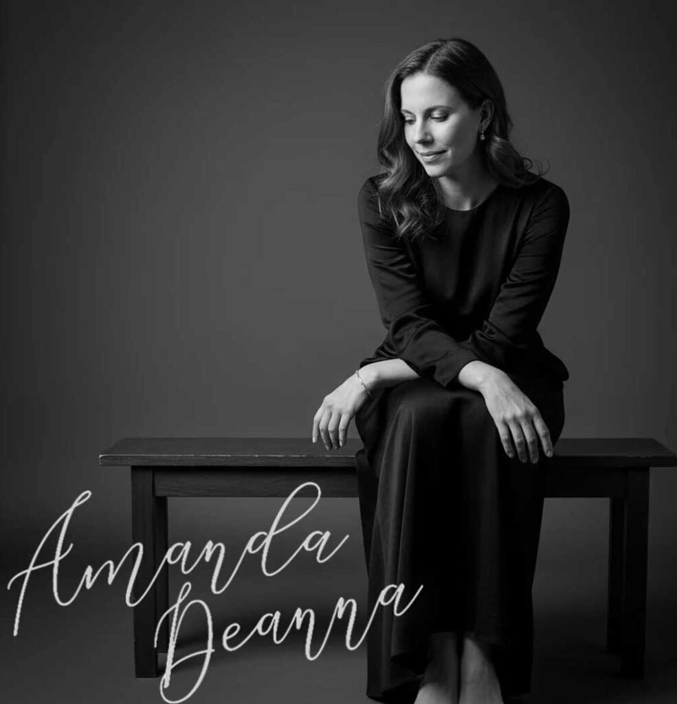 Professional full-body portrait of Amanda Deanna, RN, CDOE, CAAT; a Registered Nurse and Diabetes Educator with 15 years of healthcare expertise